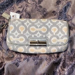 NWT Coach clutch wristlet silver gray cream print